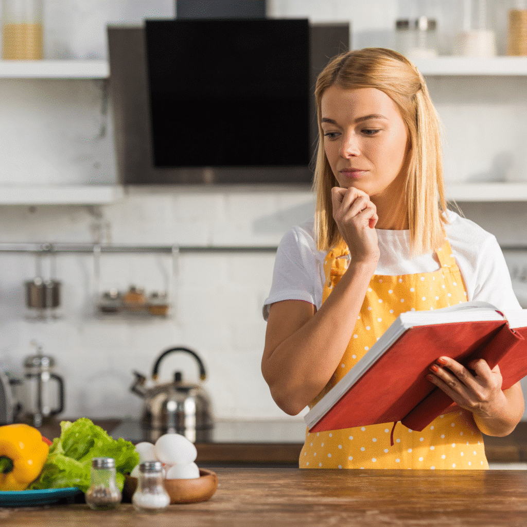About 2 Flipping through a cookbook for New Easy Recipe ideas